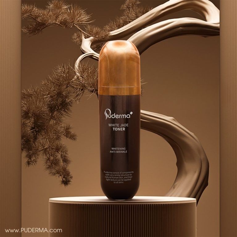 Puderma White Jade Toner bottle on a pedestal with artistic background elements.